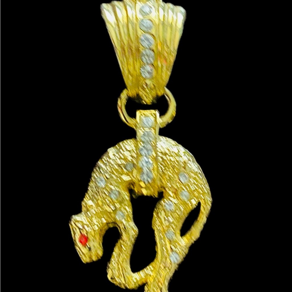 Gold Snake Pendant with Red and Silver Accents